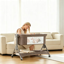 Load image into Gallery viewer, LADIDA 4-in-1 Bedside Baby Crib - 6-Level Adjustable, Easy Fold Travel Cot with Wheels, Storage, Mosquito Net &amp; Mattress, Portable for Newborn (Oatmeal)